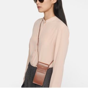 SUNGLASSES POUCH IN TRIOMPHE CANVAS AND LAMBSKIN
TAN